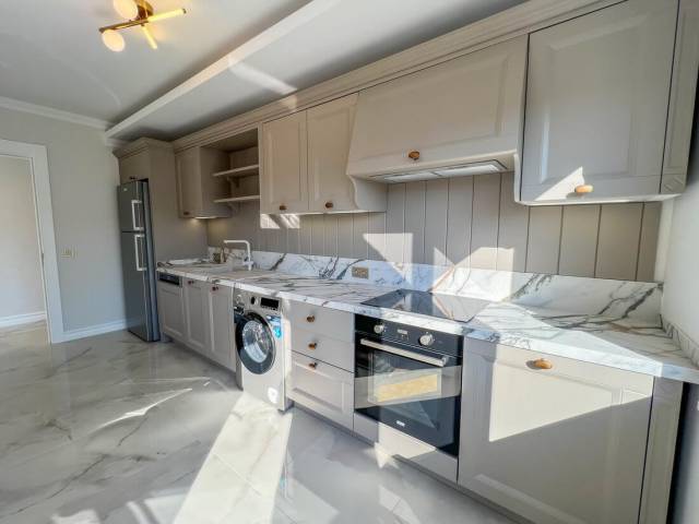 Apartment in a new house with household appliances