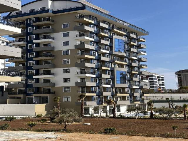 Apartment in a new complex, 2 + 1 layout in Avsallar